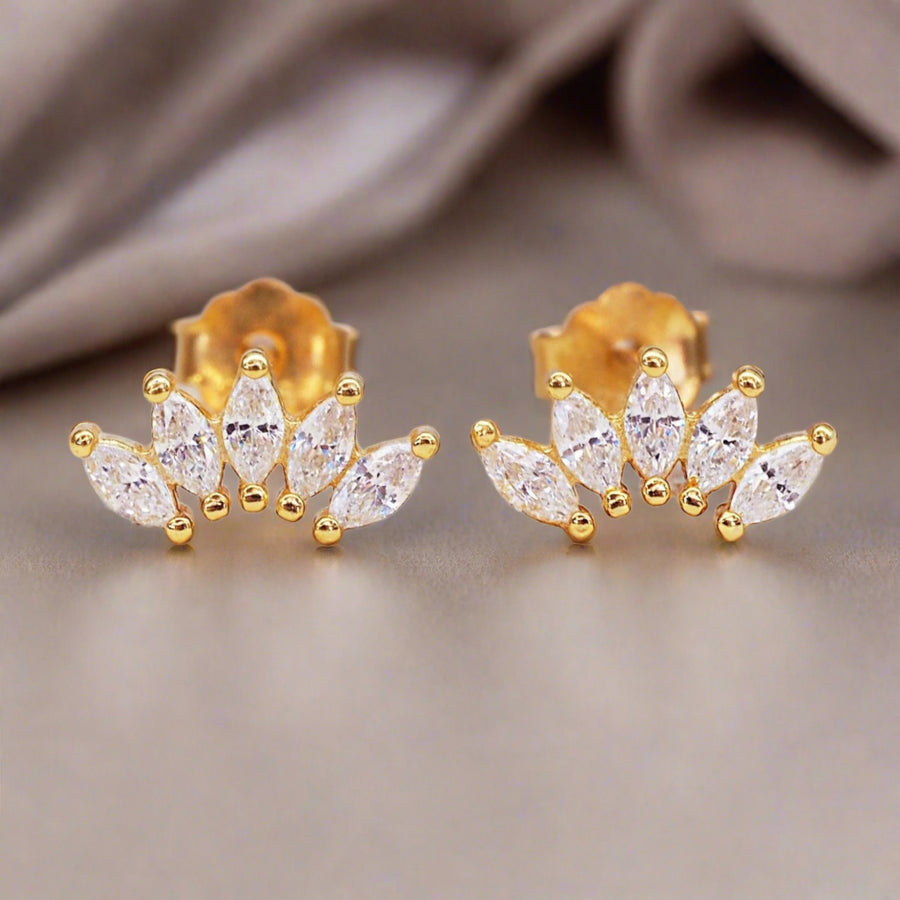 Dainty Gold stud earrings featuring sparkling cubic zirconias