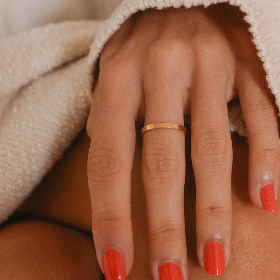 Woman with red nails wearing rose gold stacker Ring - womens rose gold waterproof jewellery Australia 