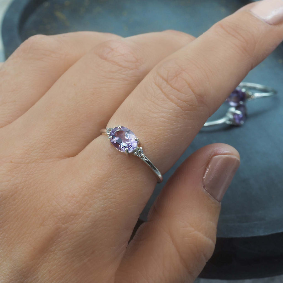 Finger wearing pink amethyst ring - women's pink amethyst jewellery - promise ring