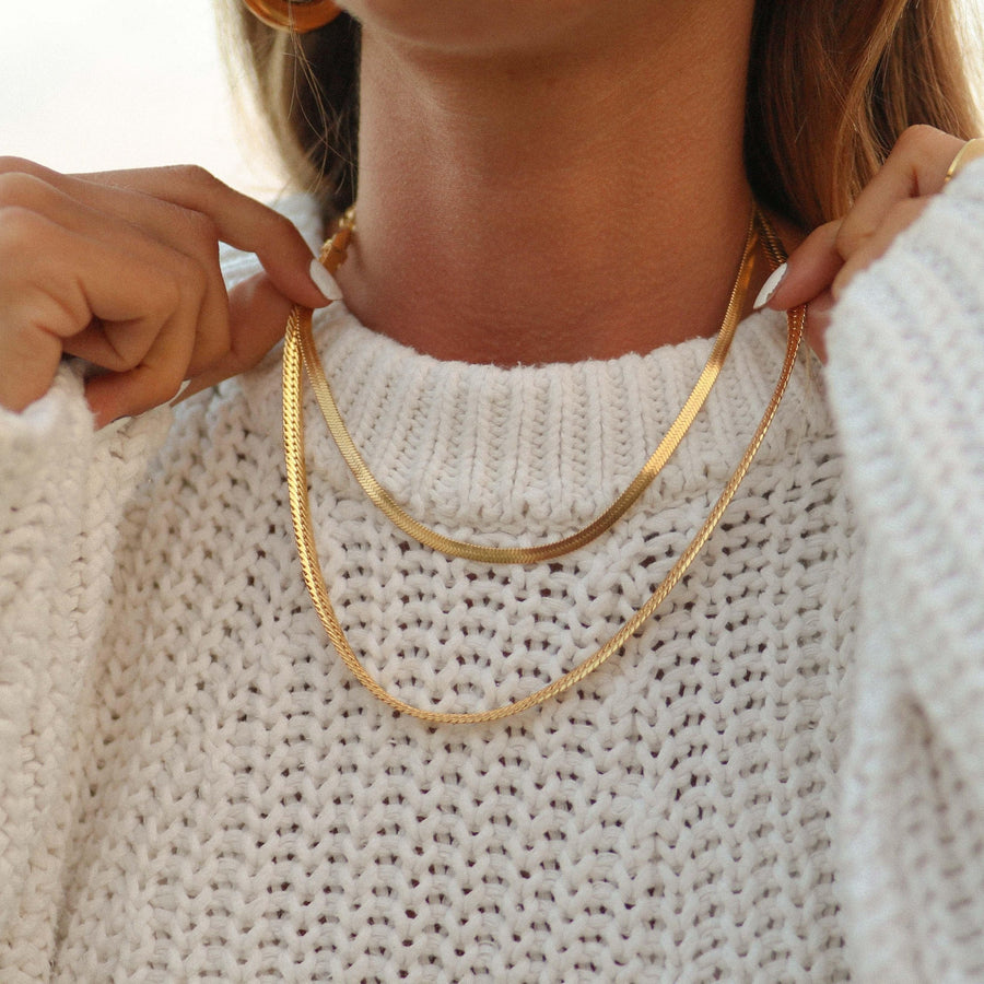 Woman wearing gold Necklaces - gold jewellery australia