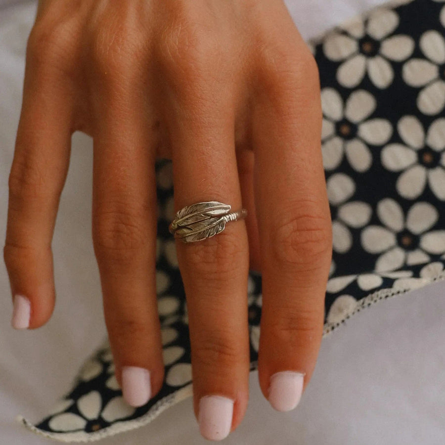 woman's hand wearing a sterling silver feather ring - sterling silver jewellery Australia 