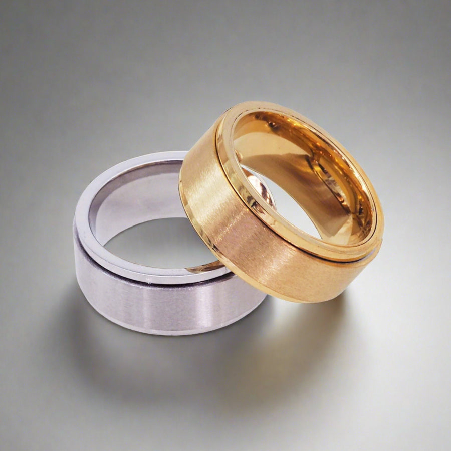 Two Titanium Meditation Spinner Rings in silver and gold - womens waterproof jewellery Australia