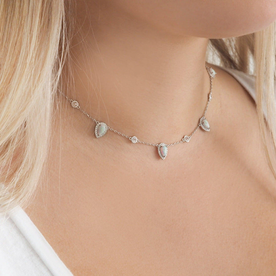 woman with blonde hair wearing dainty sterling silver Opal Necklace - womens opal jewellery australia
