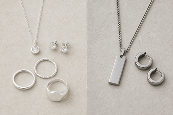 Sterling silver and stainless steel jewellery displayed side by side on a neutral background.