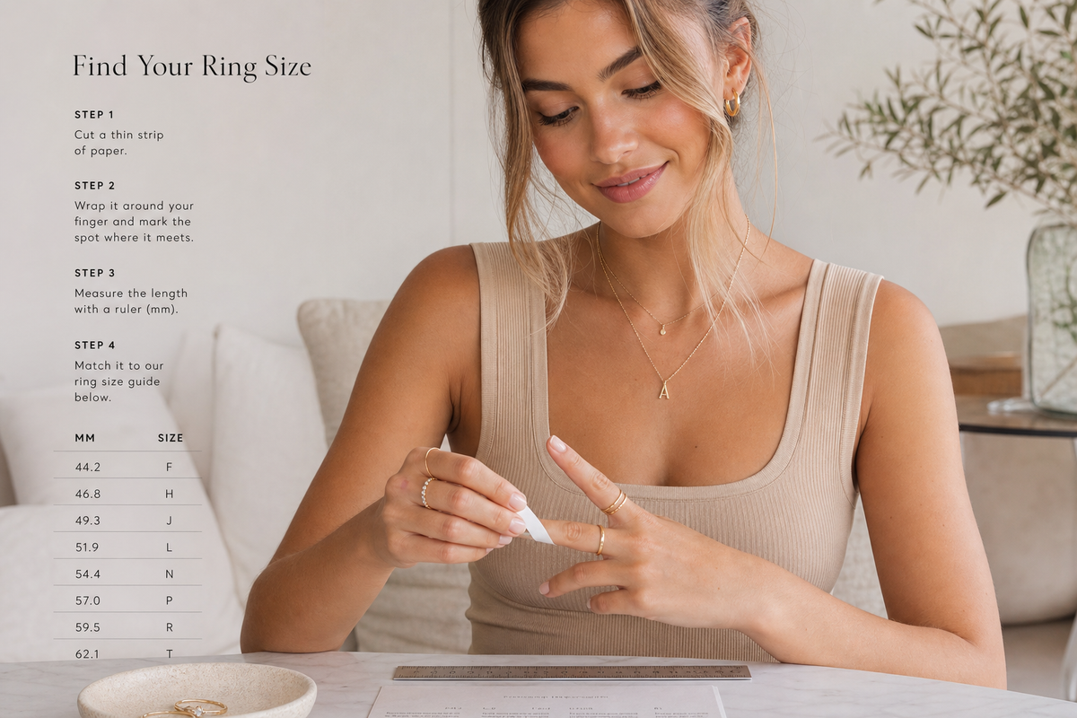Woman measuring her ring finger at home with a paper strip and ruler