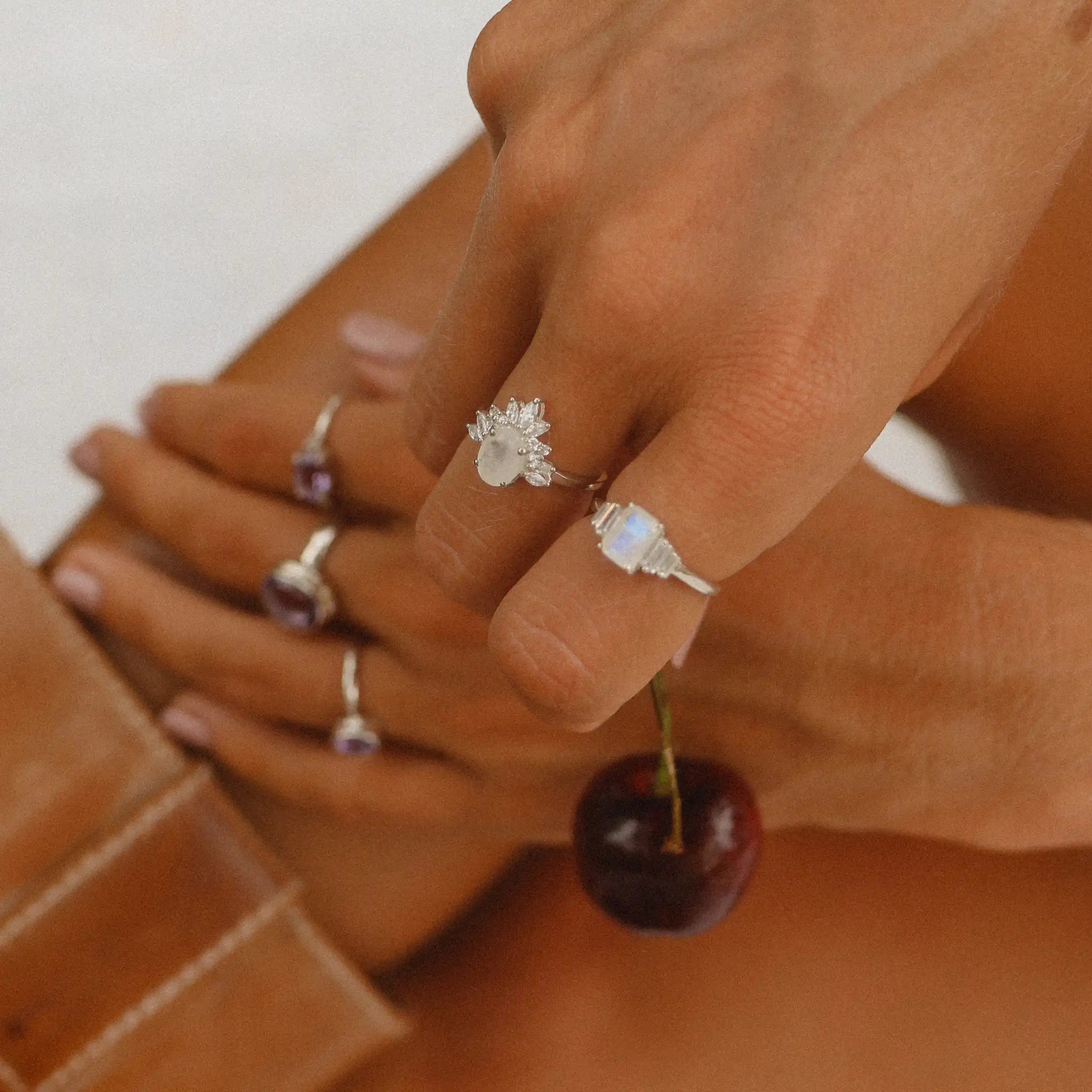 Indie and Harper Gemstone Rings Collection - hand wearing multiple natural gemstone rings