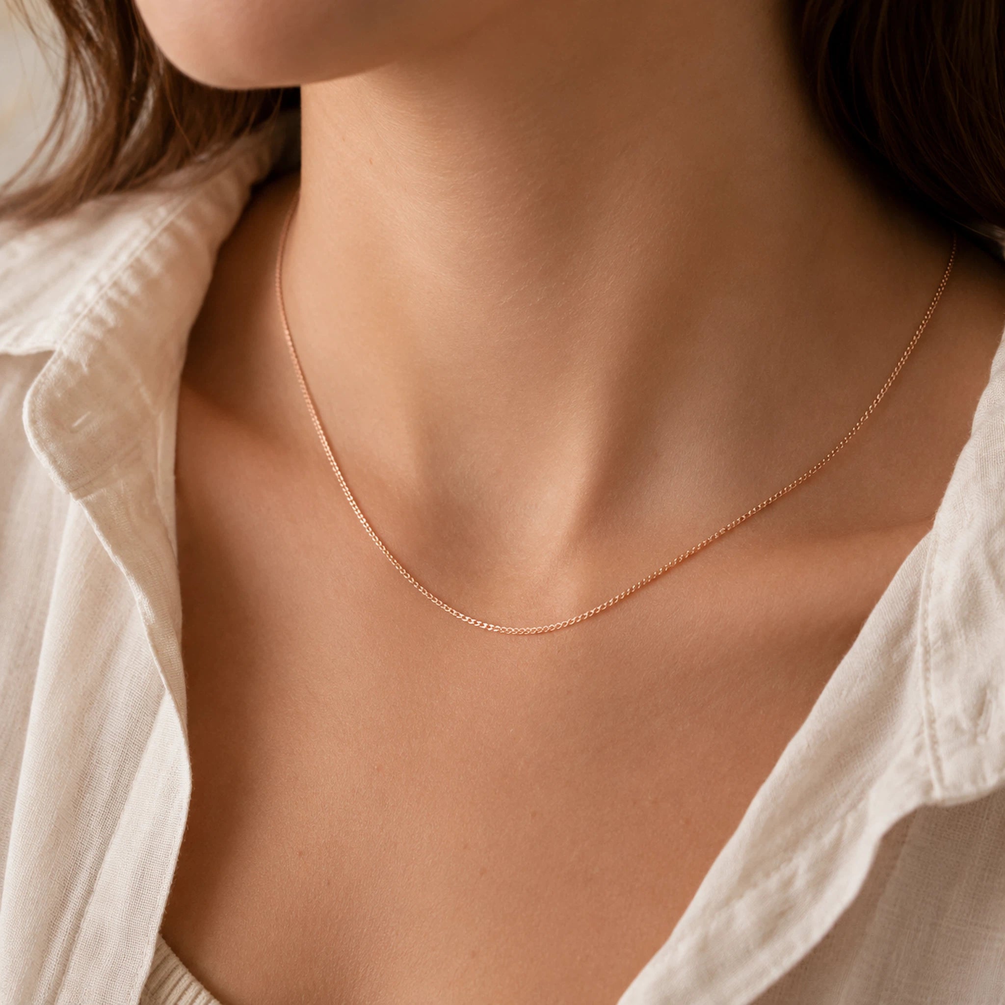 model wearing a minimalist 18k Rose Gold Curb Chain Necklace