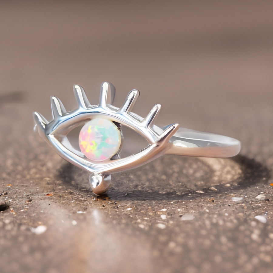 Side shot of opal ring with evil eye design - op jewellery Australia 