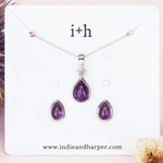 Sterling silver jewellery set with tear drop shaped natural amethyst earrings and necklace