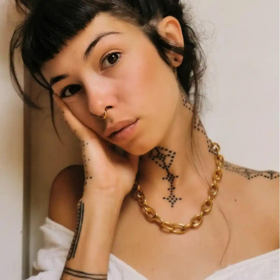 Chunky gold Necklace worn by woman with black neck tattoos - womens gold jewellery by indie and harper