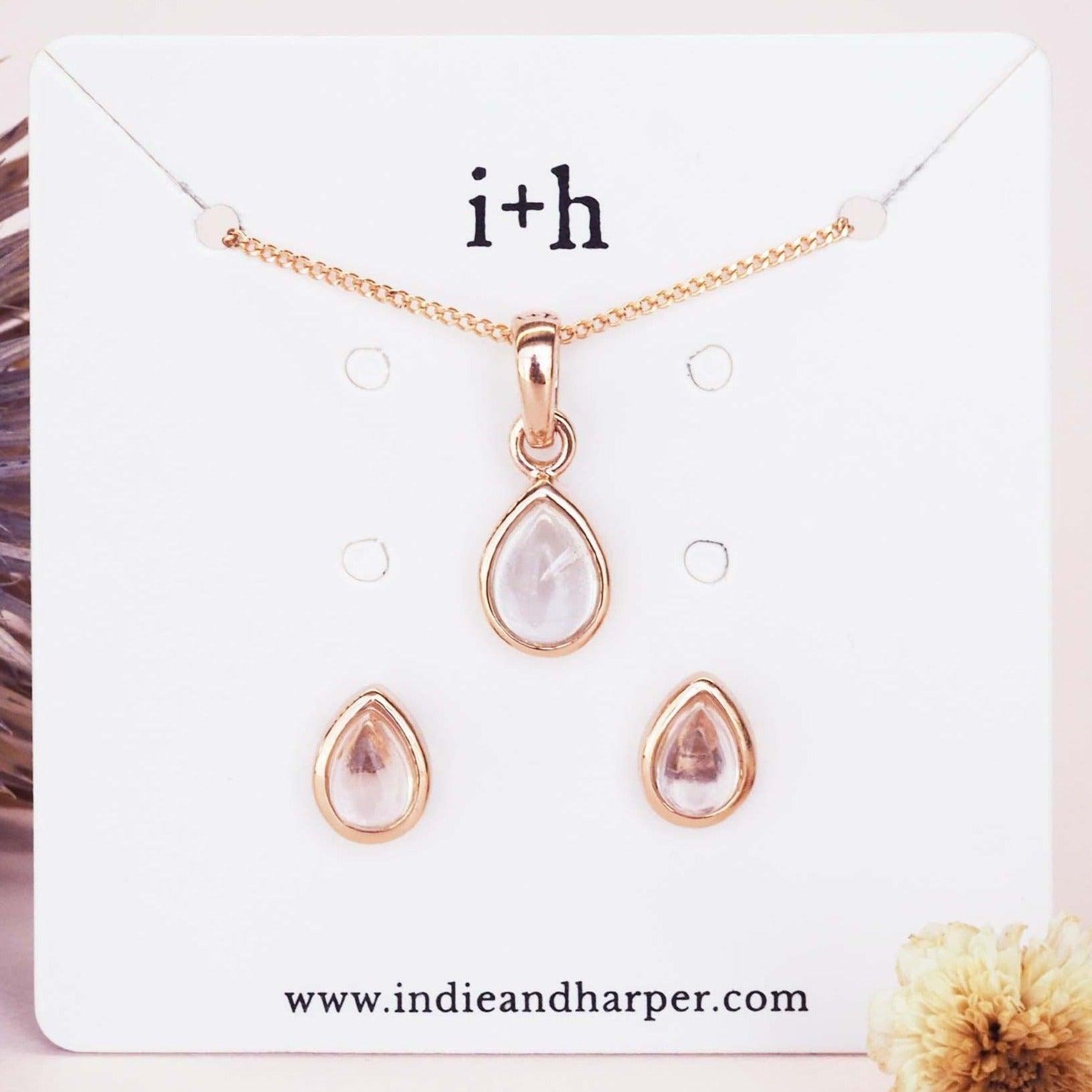 Gold teardrop herkimer quartz necklace and earrings set on a branded card with 'i+h' and www.indieandharper.com.