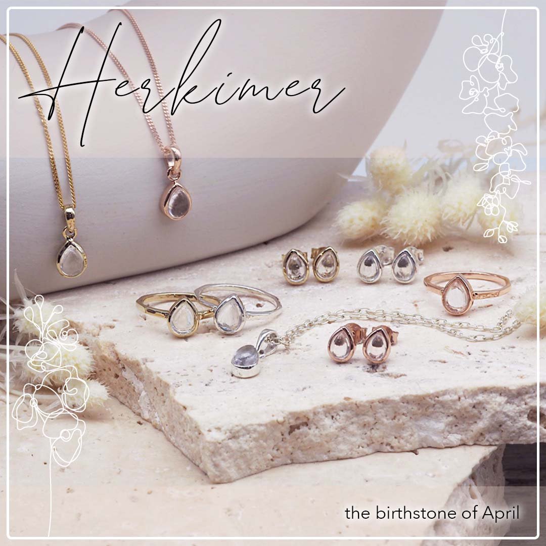 april birthstone jewellery group shot - necklaces, earrings and rings in rose gold, gold and sterling silver