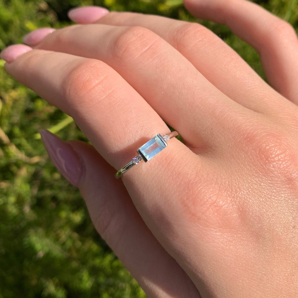 woman wearing sterling silver white topaz and aquamarine ring - womens aquamarine jewellery by Australian jewellery brands indie and Harper 