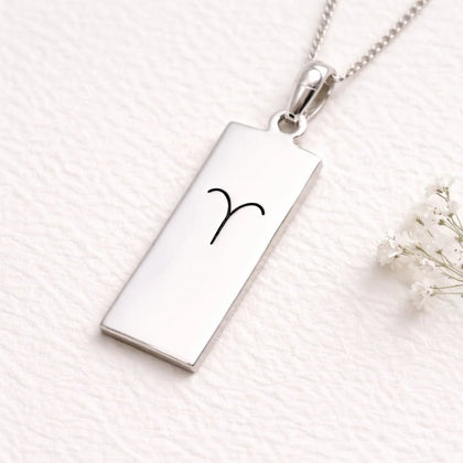 sterling silver necklace with rectangle pendant with aries zodiac