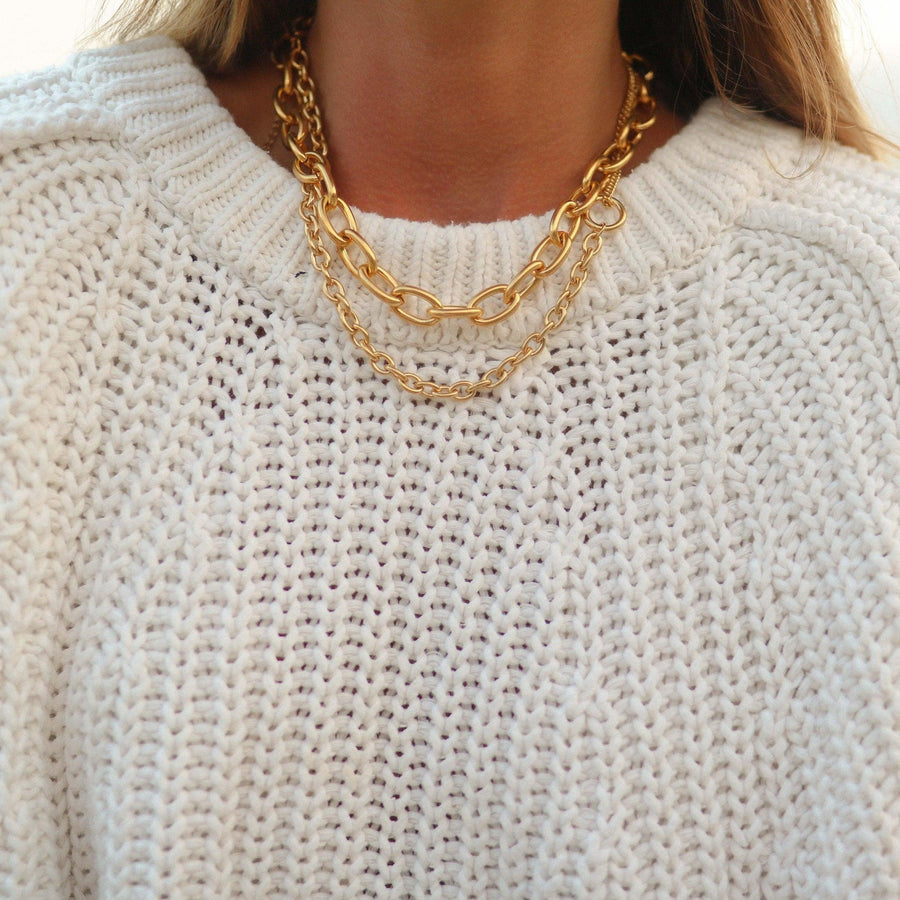 woman wearing chunky gold necklaces - waterproof gold jewellery australia