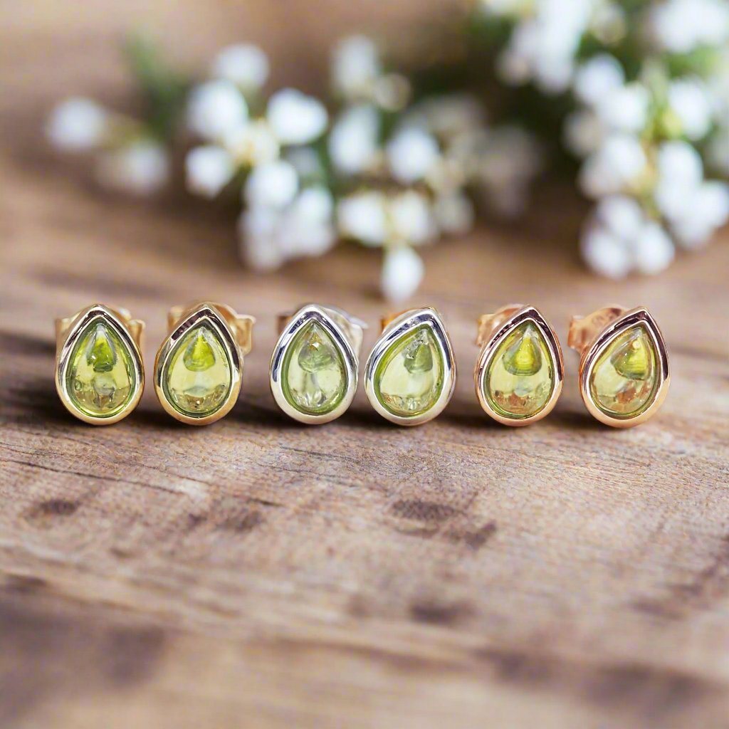 august birthstone peridot earrings in rose gold, silver and gold by indie and harper