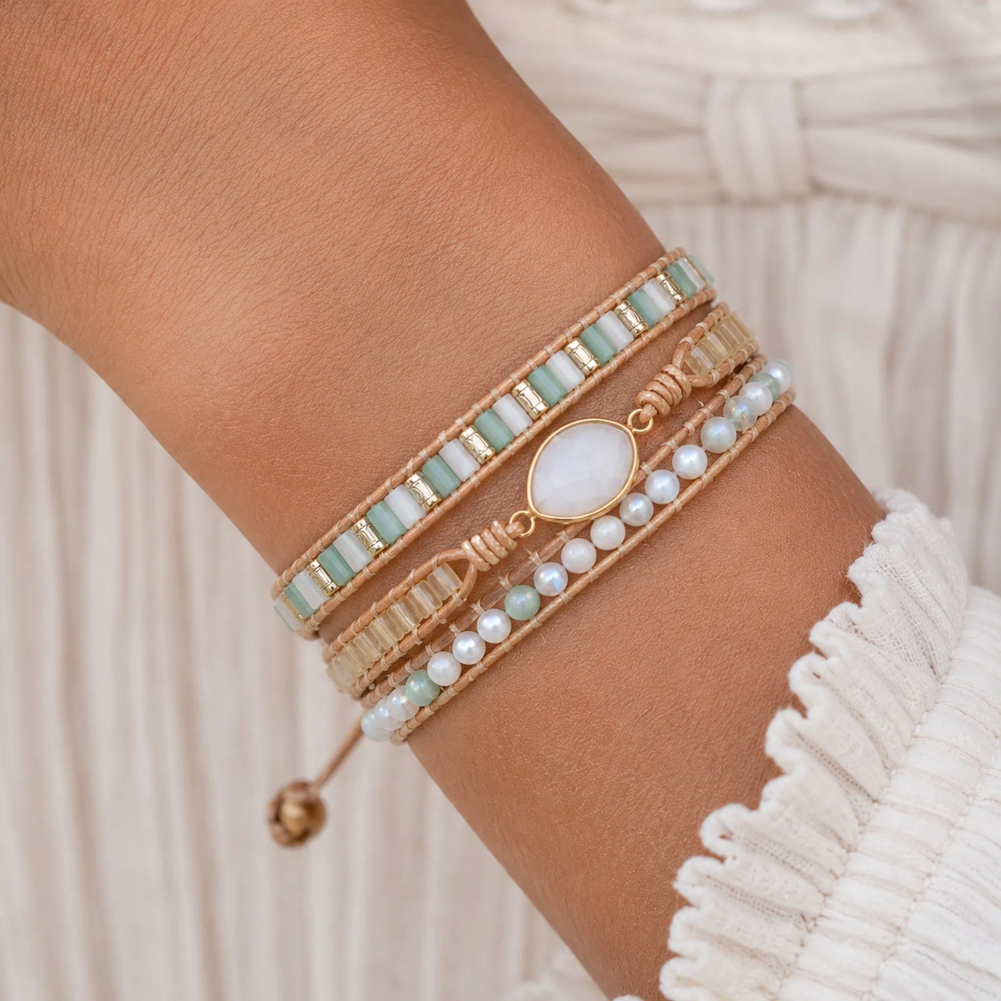 bohemian style beaded wrap bracelet with gold and moonstone worn