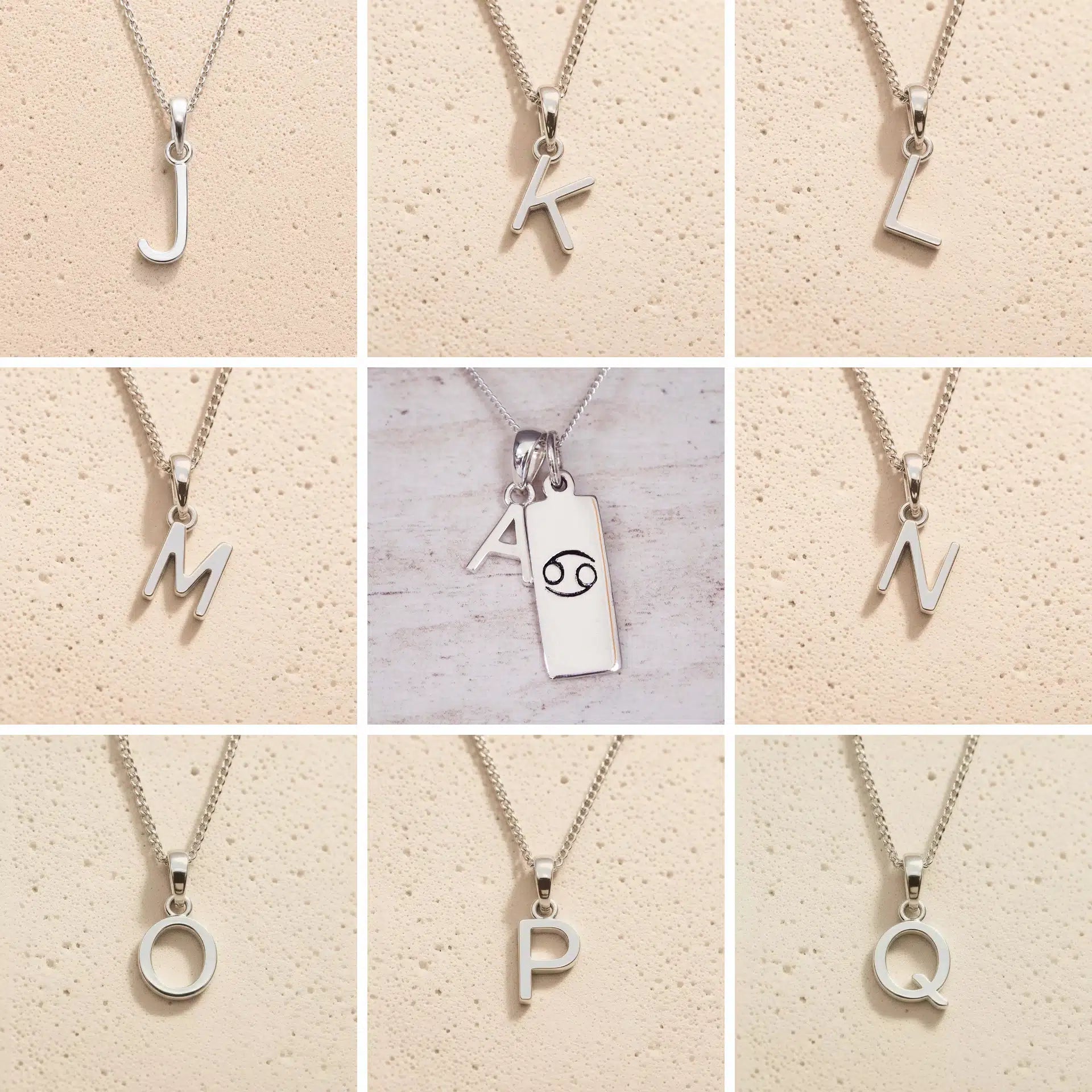 Silver letter pendants from J to Q on a beige background as personalised letter options for the Cancer Zodiac Necklace