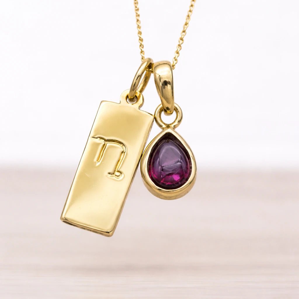 Gold january birthstone necklace with Capricorn zodiac and natural garnet gemstone pendant - meaningful january birthday jewellery gift