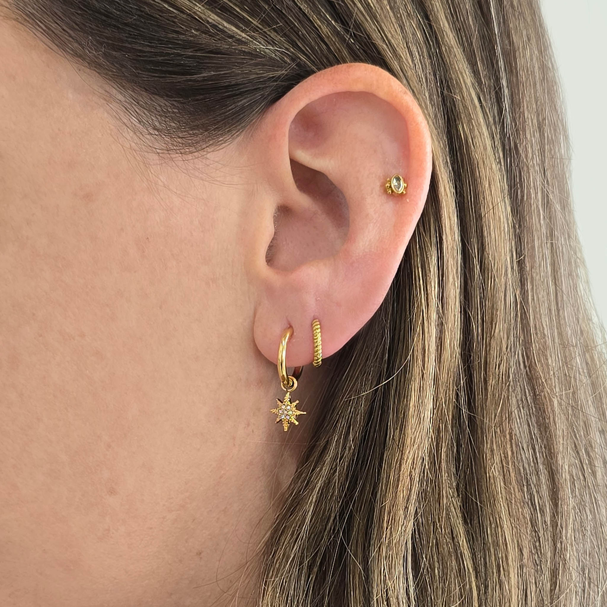 celestial glimmer gold set of earrings being worn - indie and harper australia