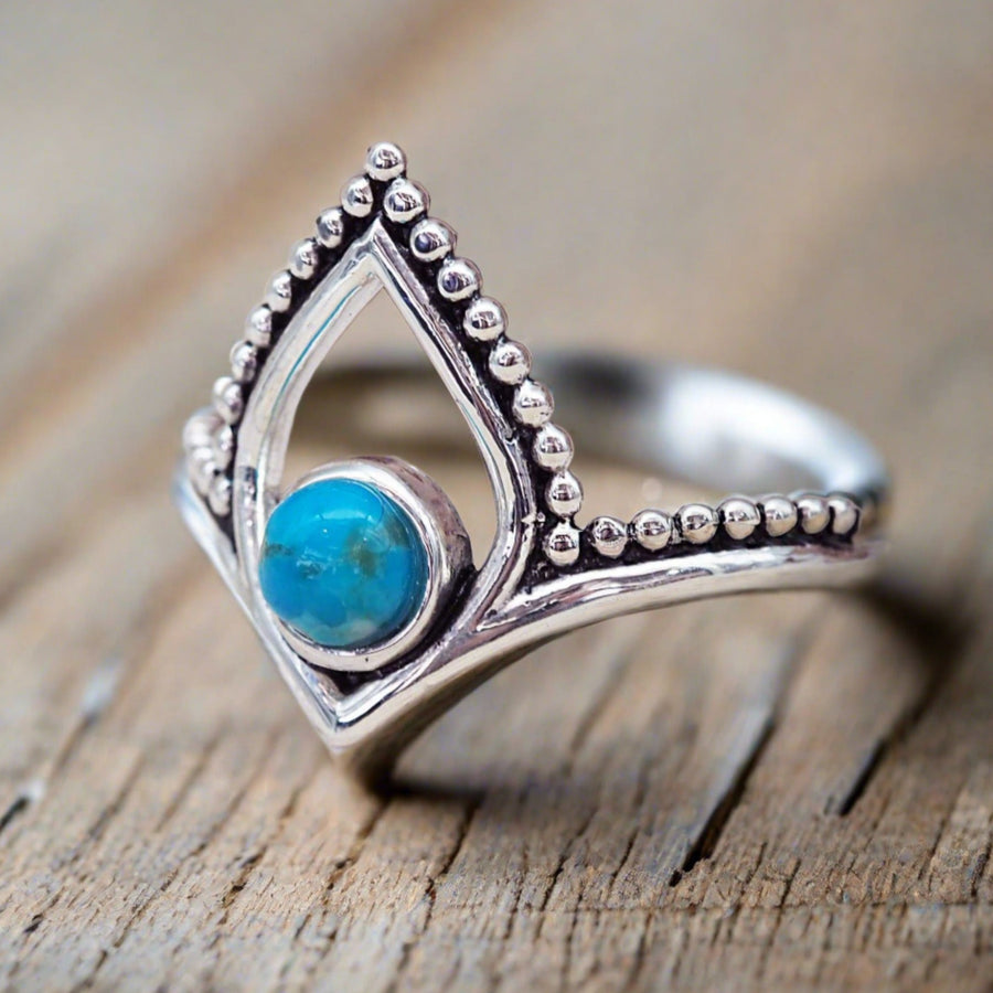 turquoise ring on wood bench - sterling silver jewellery - Australian jewellery brand
