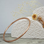 Thin rose gold bangle made with stainless steel - waterproof jewellery