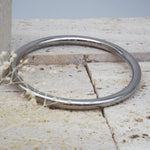 Classic bangle made out of stainless steel. Waterproof jewellery by online jewellery brand indie and harper.