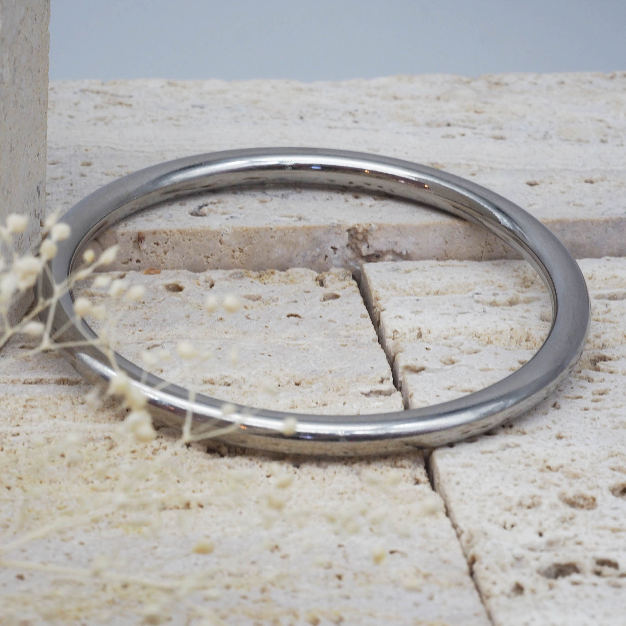 Classic bangle made out of stainless steel. Waterproof jewellery by online jewellery brand indie and harper.