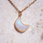 gold plated chain with a crescent moon shaped natural Moonstone pendant 