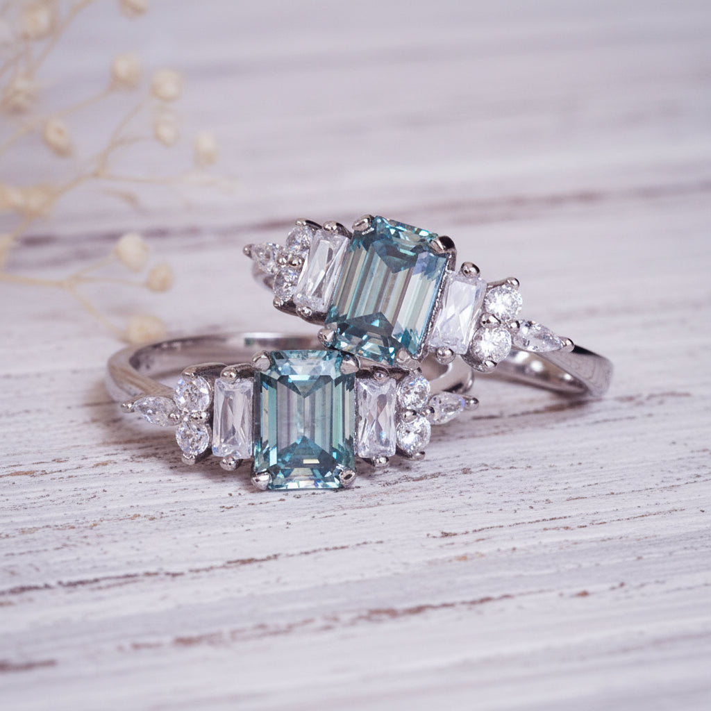 Pair of diamond-studded rings on a textured surface