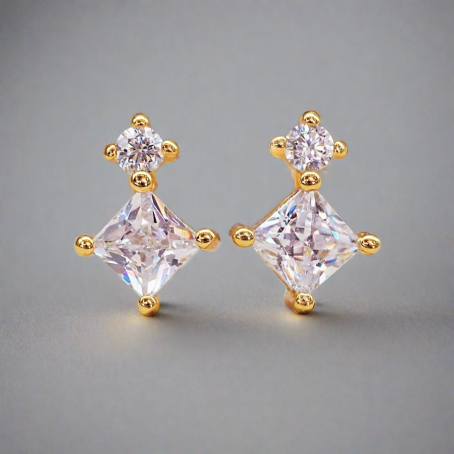 dainty gold stud earrings with cubic zirconias