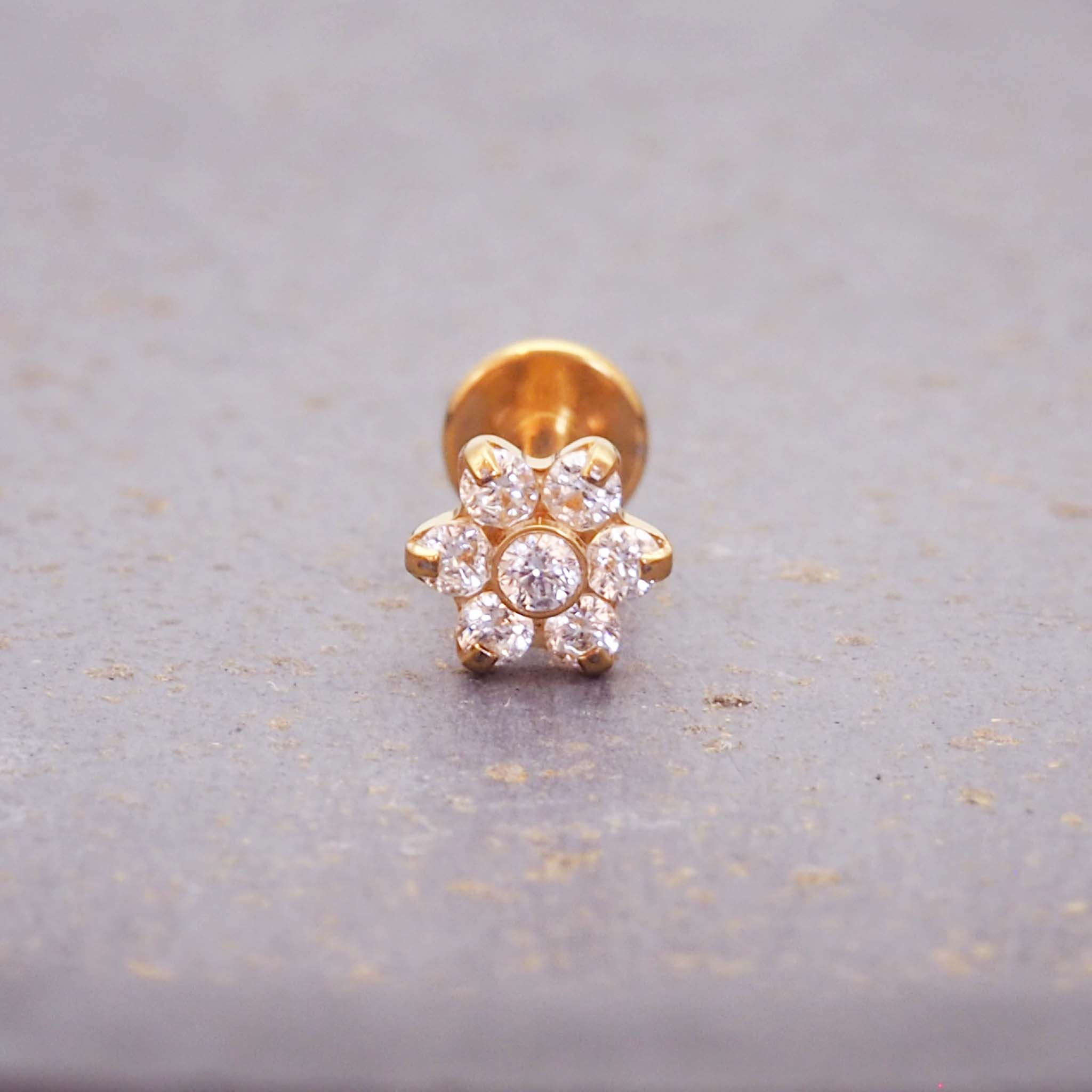 dainty gold plated flower helix flat back earrings - made with dainty cubic zirconia and gold plating over stainless steel by indie and harper