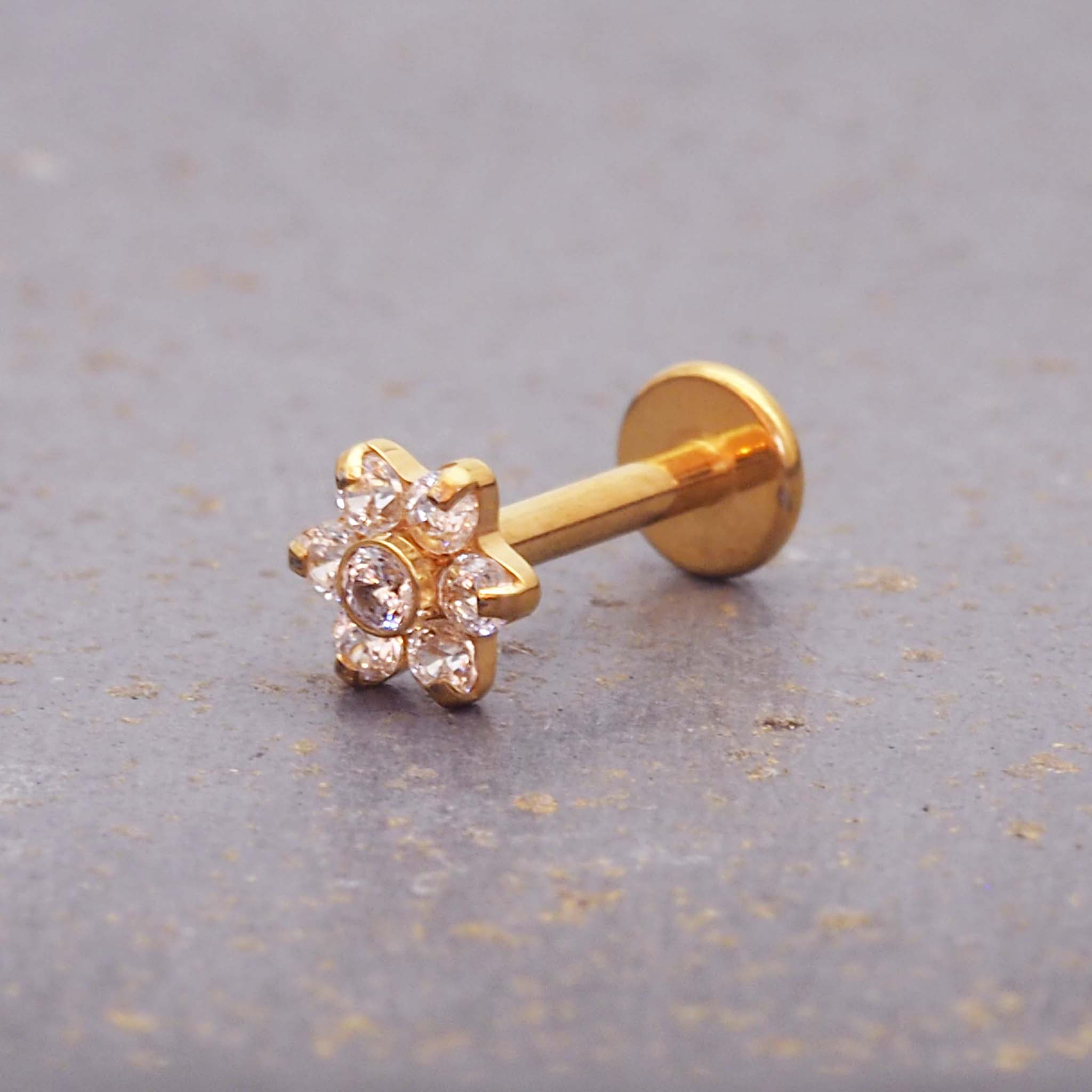 dainty flower helix earrings made with gold plating over stainless steel and dainty cubic zirconia - alternative jewellery online by indie and harper