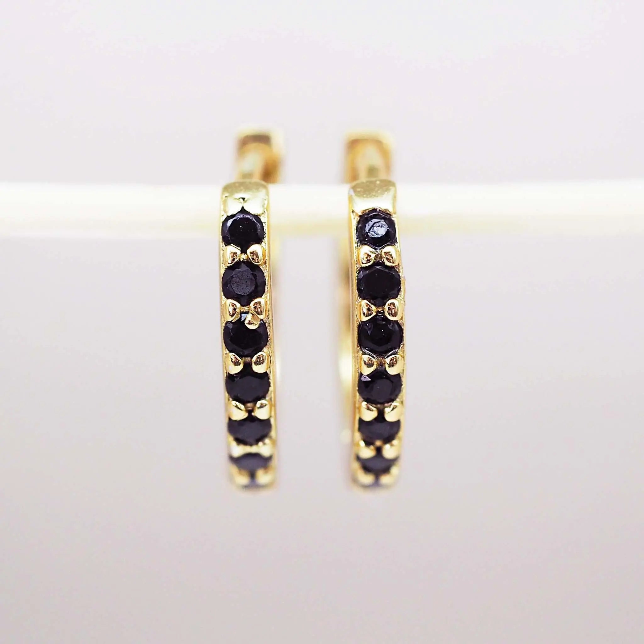 dainty gold huggie earrings with black cubic zirconias - womens gold jewellery by Australian jewellery brands online indie and Harper 