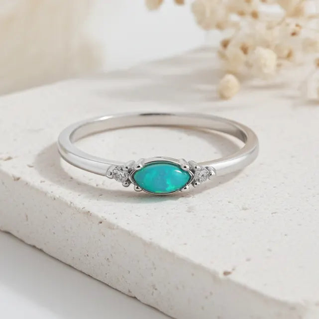 dainty sterling silver ring with CZs and green opal by indie and harper