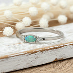 dainty sterling silver ring with CZ and green opal