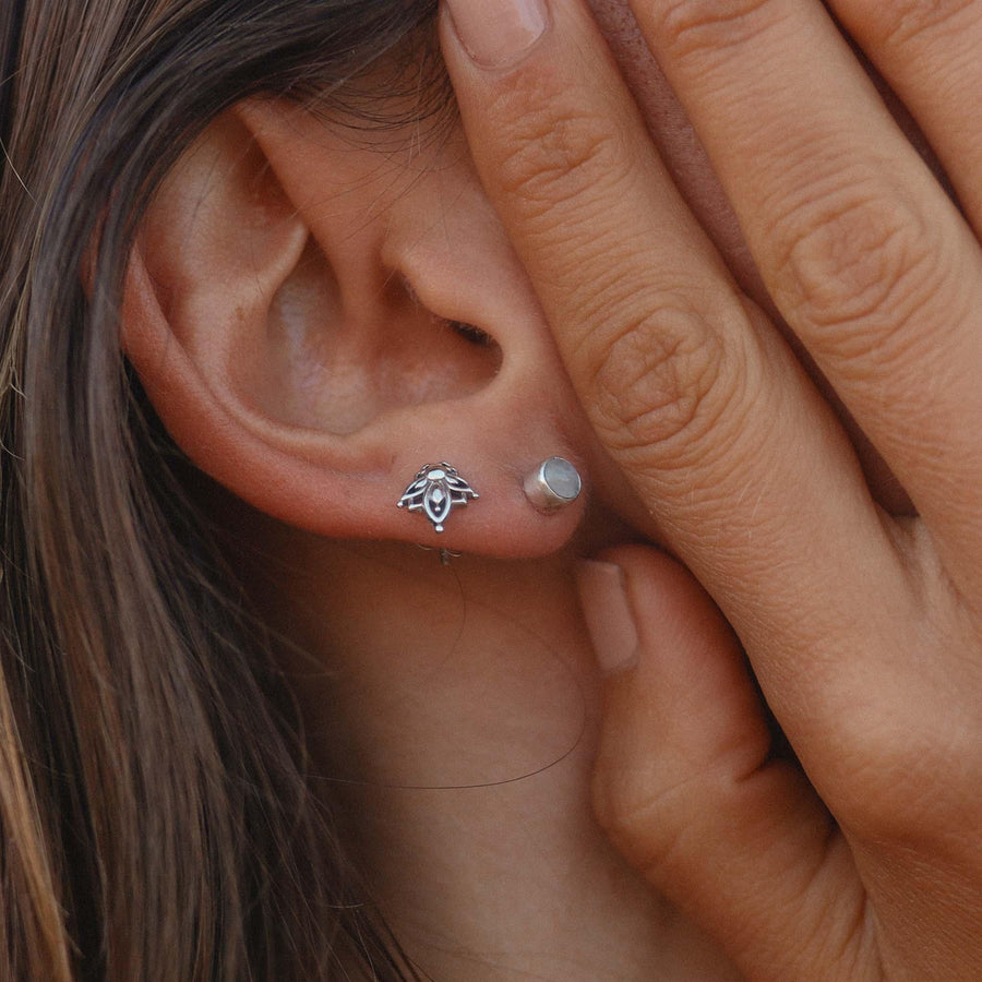 Woman wearing dainty sterling silver moonstone earrings - sterling silver jewellery 