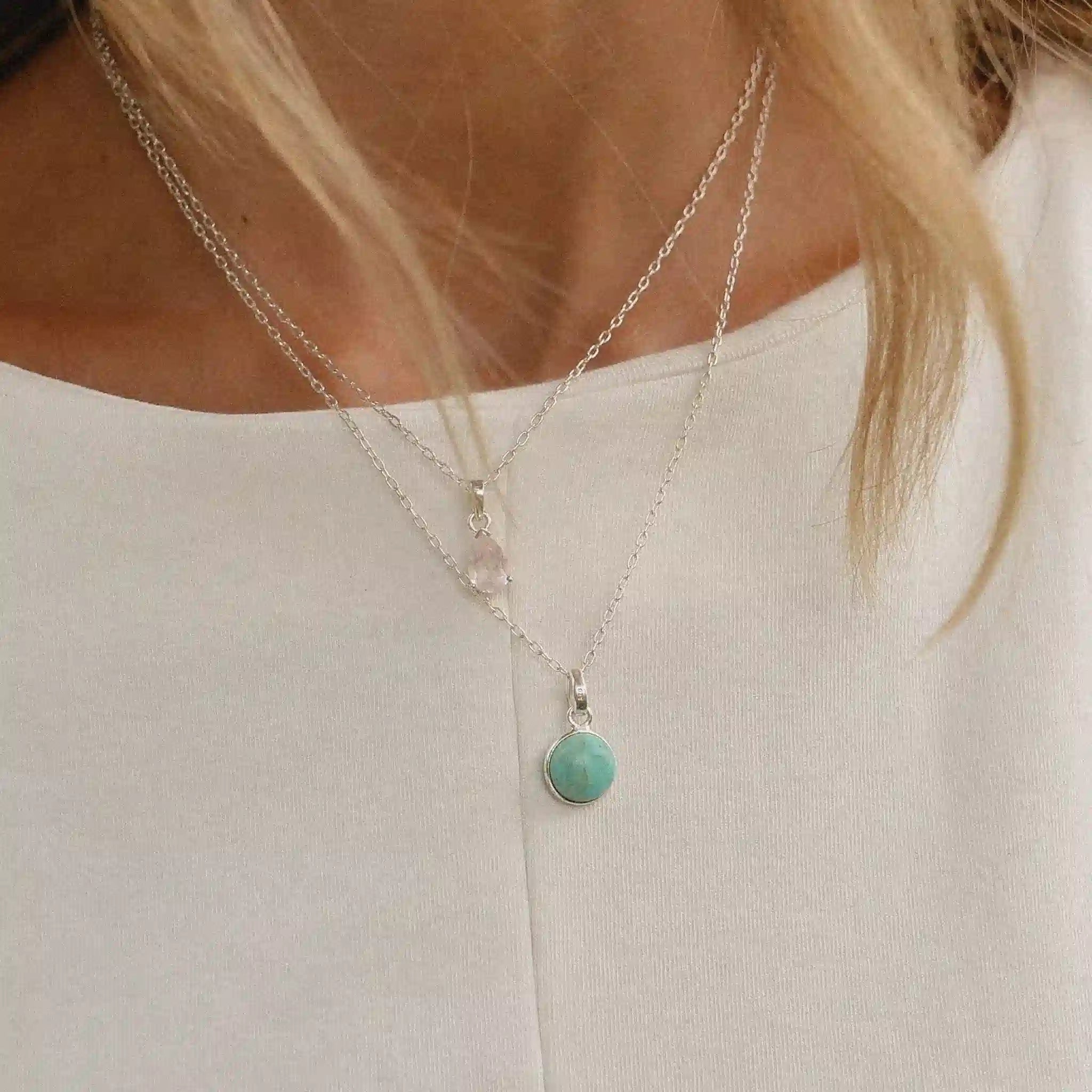 woman wearing sterling silver turquoise necklace