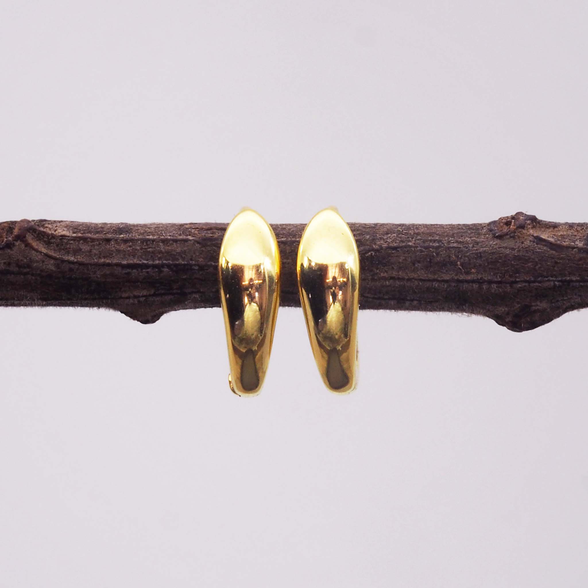 dainty gold huggie earrings by  indie and harper australia