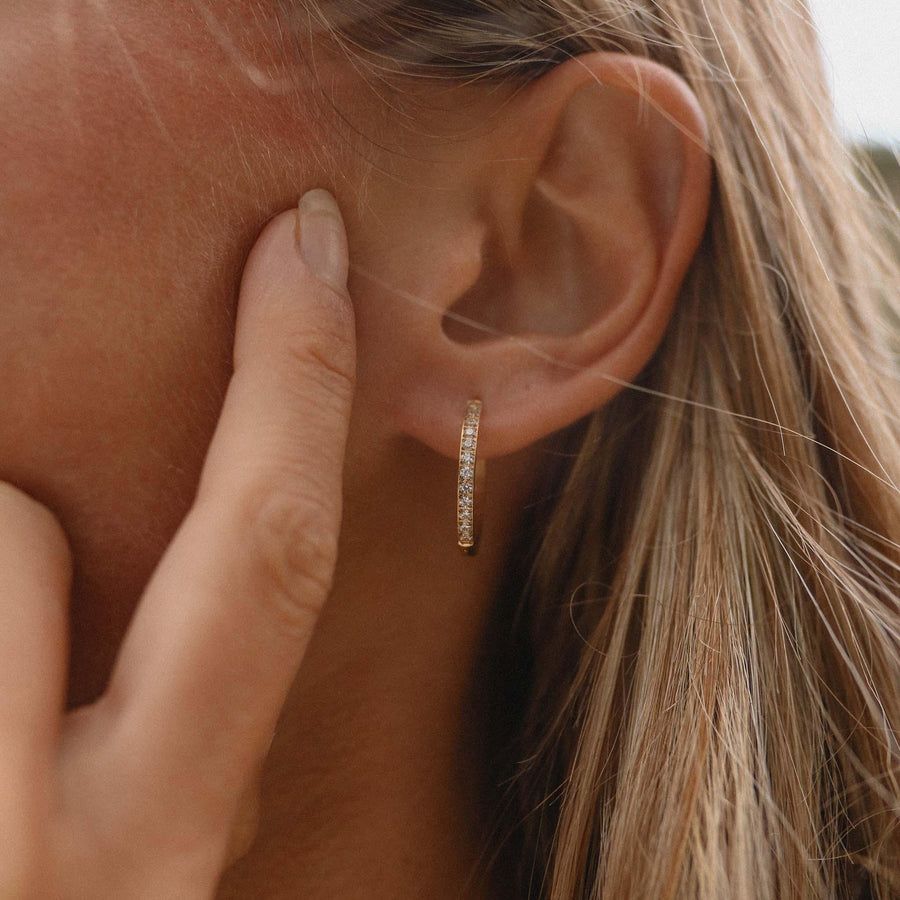 Woman wearing gold Hoop Earrings - womens gold jewellery