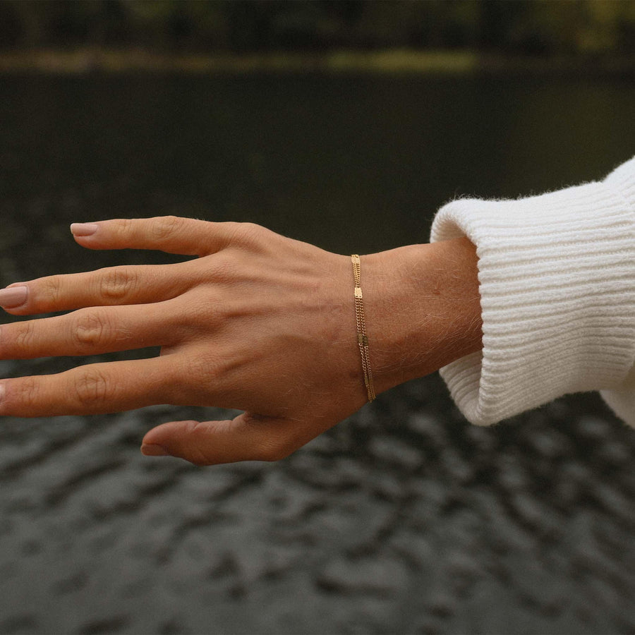 Woman wearing Gold Bracelet - gold waterproof jewellery - Australian jewellery brand 