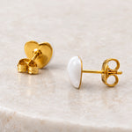 White epoxy heart stud earrings in gold PVD stainless steel, back view