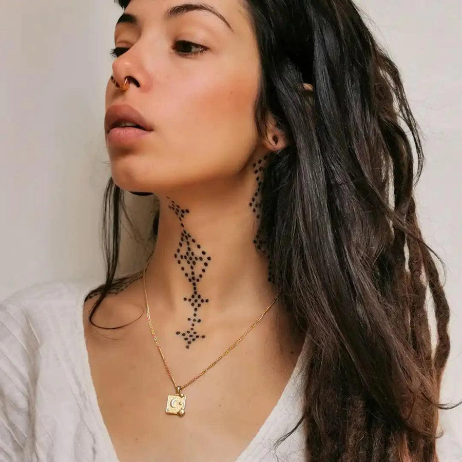 Woman with black neck tattoos and dreadlocks wearing Gold Necklace - womens waterproof jewellery - Australian jewellery brand