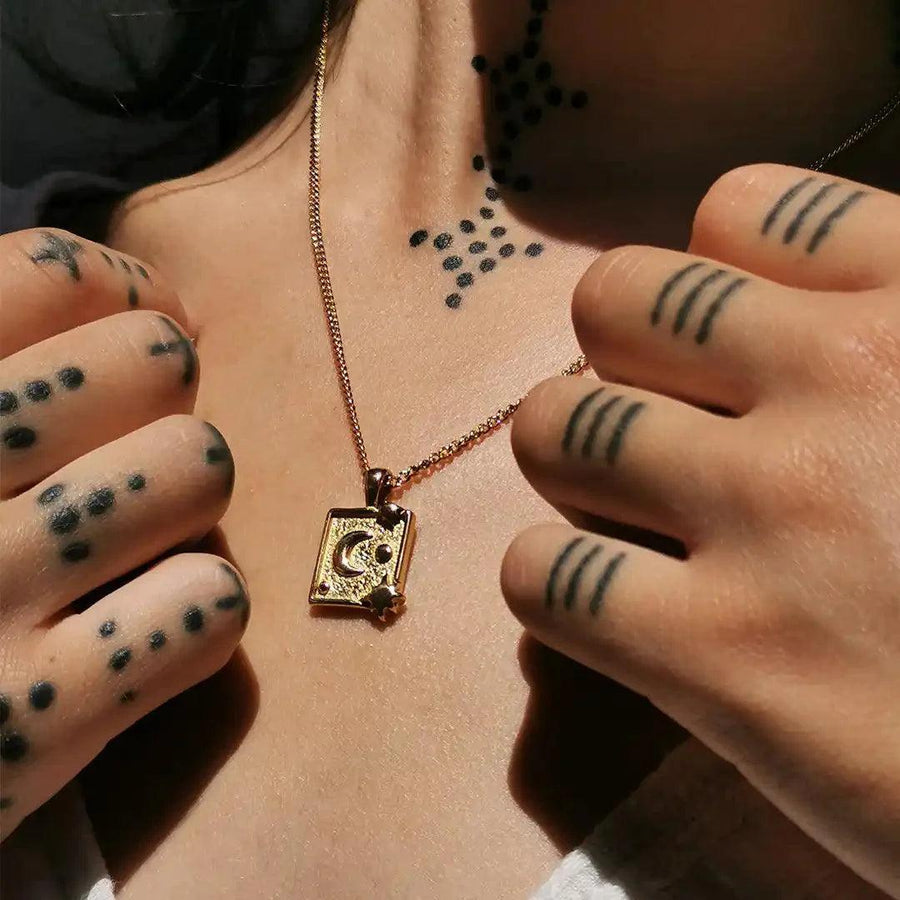 Woman with black tattoos wearing Gold Necklace - womens waterproof jewellery - Australian jewellery brand