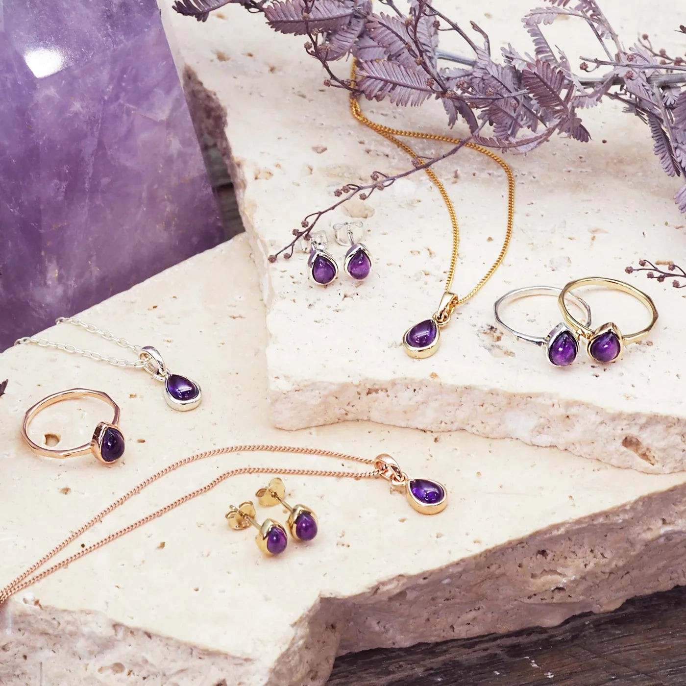 group shot of february birthstone jewellery including amethyst earrings, rings and necklaces by indie and harper jewellery australia