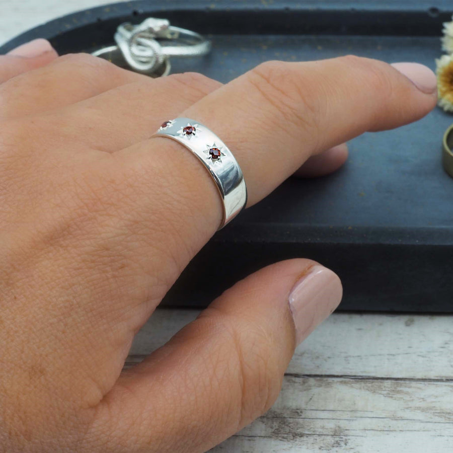 silver garnet ring being worn - sterling silver garnet jewellery