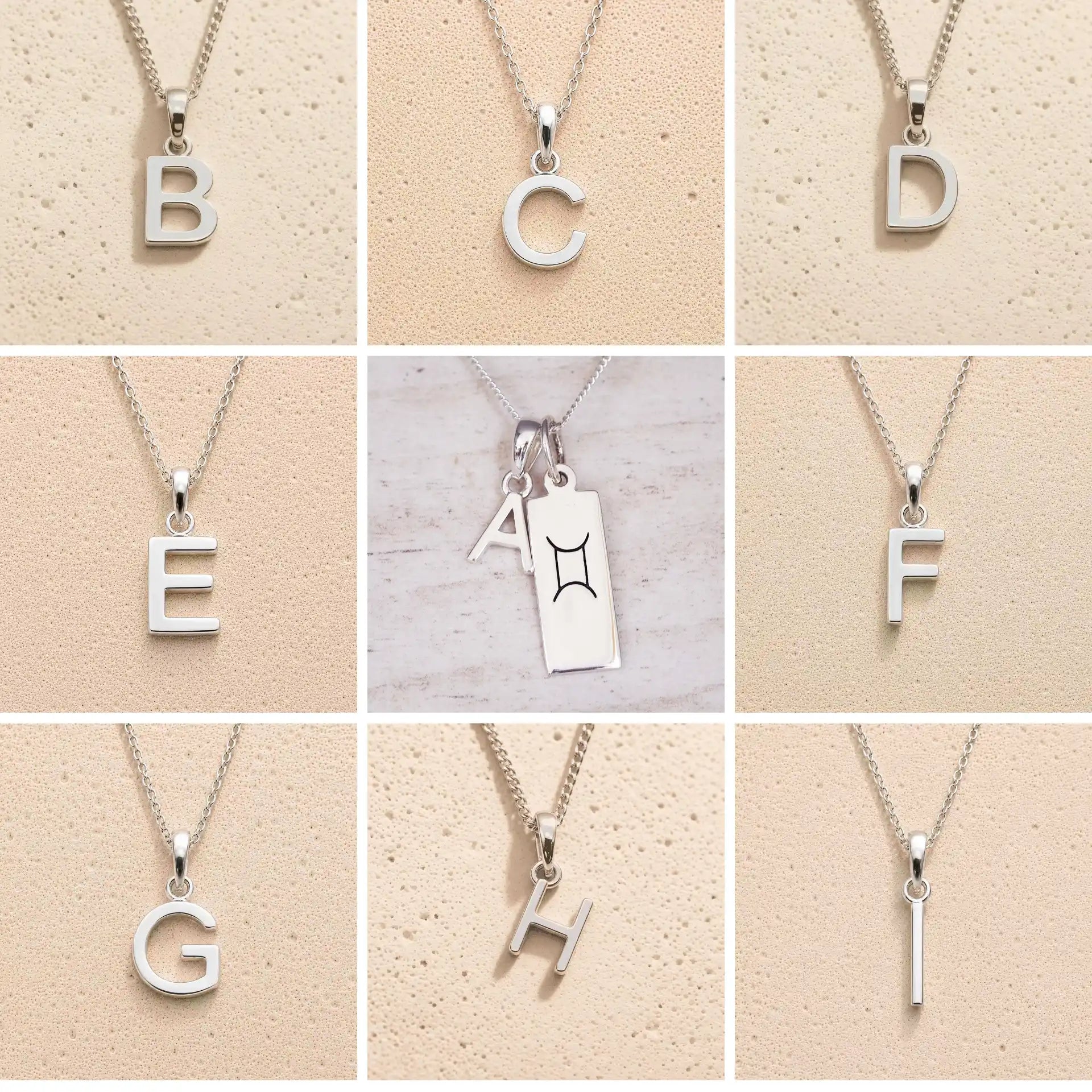 Collection of sterling silver letter pendants a, b, c, d, e, f, g, h, i on a beige background as personalised initial options for Gemini Zodiac Necklace.