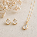 Gold April Birthstone Jewellery set featuring Clear Quartz Stud Earrings and matching Clear Quartz pendant necklace