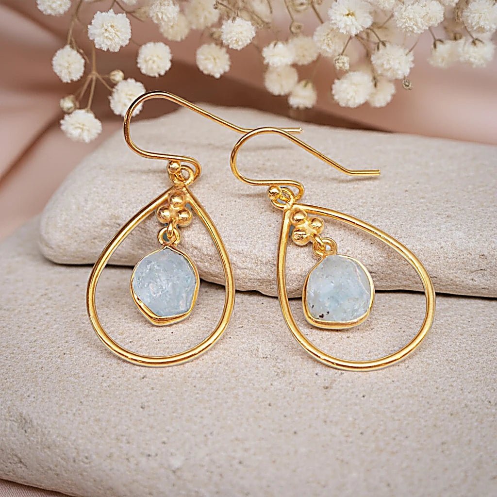 gold french hoop earrings with raw aquamarine stone