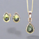 gold August birthstone peridot jewellery set featuring peridot earrings and peridot necklace by indie and harper